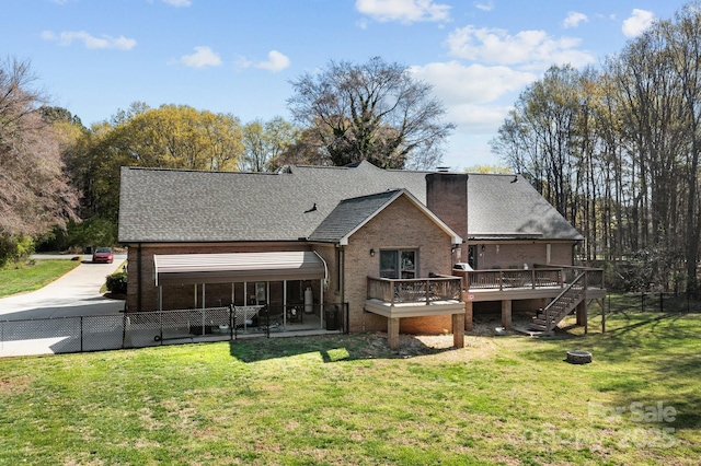 7146 Sifford Rd, Stanley, NC 28164 - back of house with a wooden deck, roof with shingles, a chimney, and an outdoor fire pit