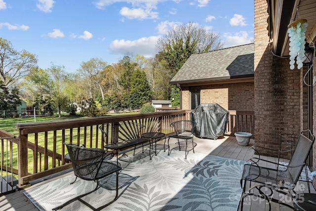 7146 Sifford Rd, Stanley, NC 28164 - wooden deck with a yard and a grill