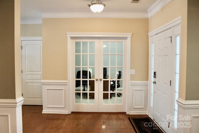 doorway featuring dark wood-style flooring, french doors, and crown molding