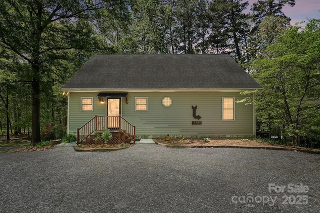 9711 Pine Tree Rd, Norwood, NC 28128 - view of front of home featuring roof with shingles