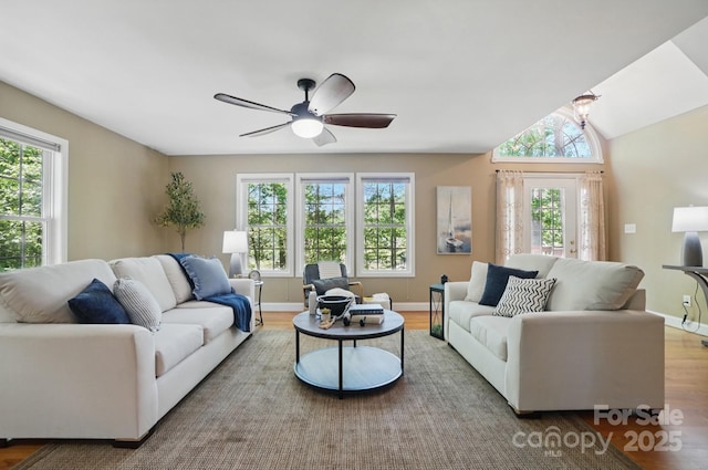 9711 Pine Tree Rd, Norwood, NC 28128 - living room with wood finished floors, a ceiling fan, and baseboards
