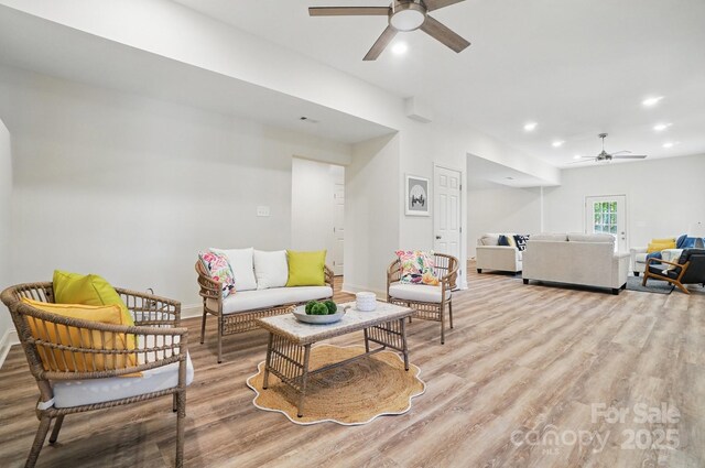 9711 Pine Tree Rd, Norwood, NC 28128 - living area featuring recessed lighting, light wood finished floors, a ceiling fan, and baseboards