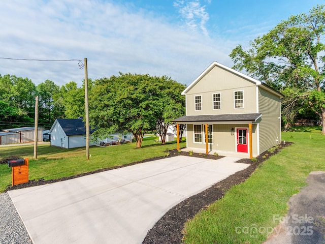 570 Key W Ave, Kannapolis, NC 28081 - view of front of property with a porch, a front yard, and concrete driveway