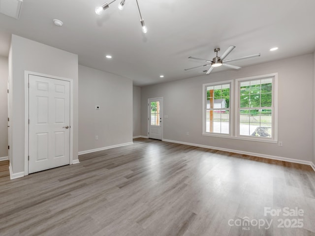 570 Key W Ave, Kannapolis, NC 28081 - spare room featuring baseboards, recessed lighting, wood finished floors, and a ceiling fan