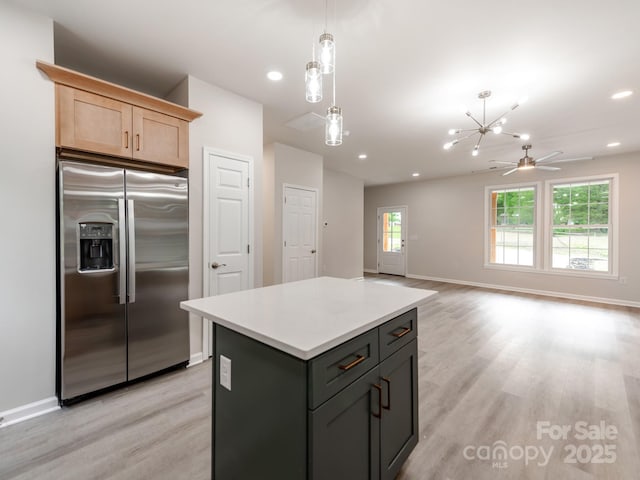 570 Key W Ave, Kannapolis, NC 28081 - kitchen featuring stainless steel fridge with ice dispenser, light wood-type flooring, baseboards, a kitchen island, and recessed lighting