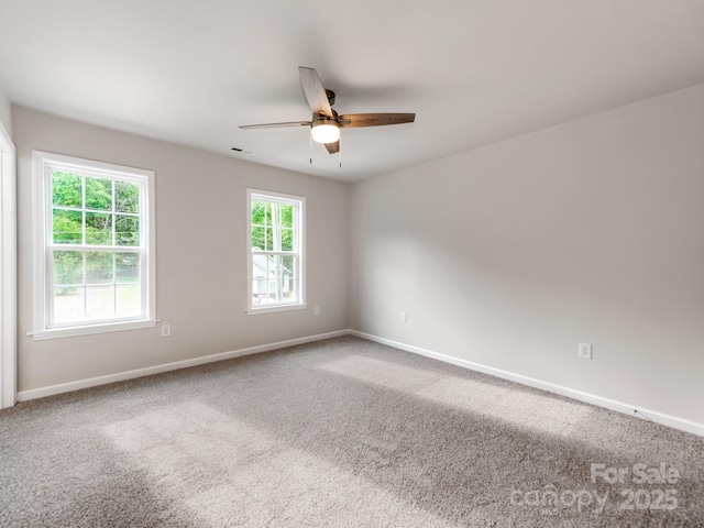 570 Key W Ave, Kannapolis, NC 28081 - carpeted spare room with a ceiling fan and baseboards