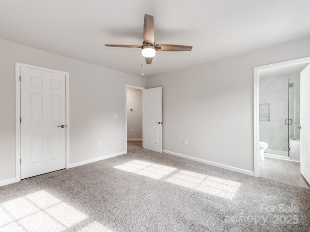 570 Key W Ave, Kannapolis, NC 28081 - unfurnished bedroom featuring carpet flooring, baseboards, ensuite bath, and a ceiling fan