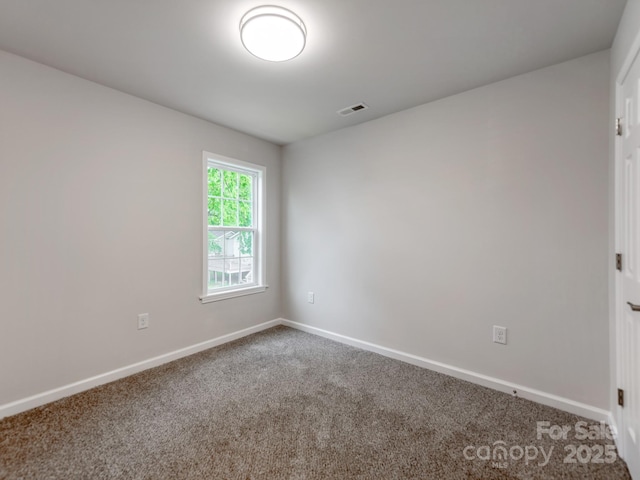 570 Key W Ave, Kannapolis, NC 28081 - unfurnished room with carpet floors and baseboards