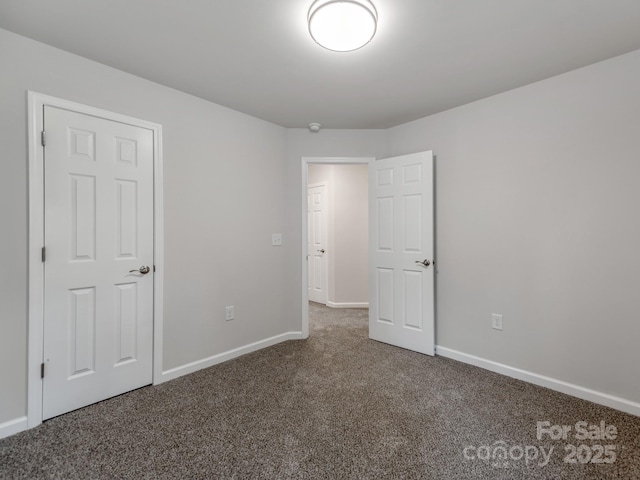 570 Key W Ave, Kannapolis, NC 28081 - unfurnished bedroom featuring carpet flooring and baseboards