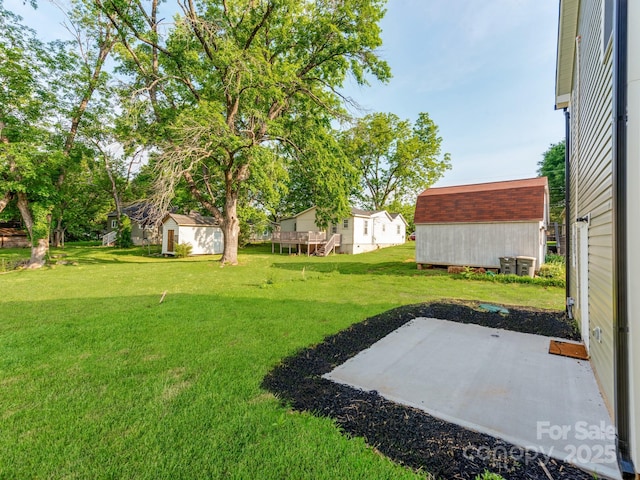 570 Key W Ave, Kannapolis, NC 28081 - view of green lawn featuring a patio area