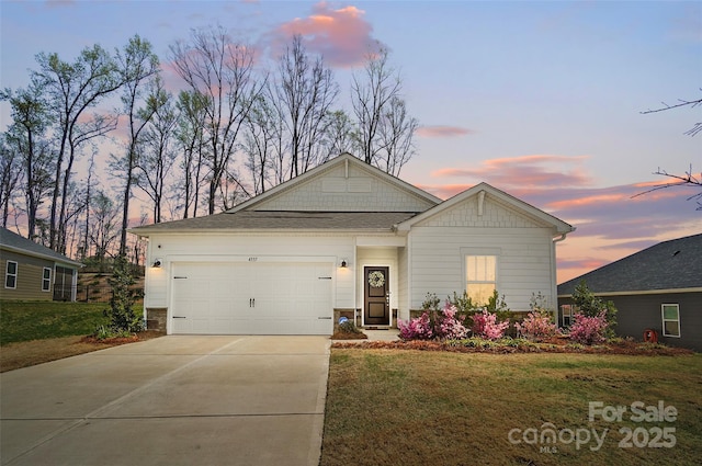 4337 Duplin Dr, Charlotte, NC 28214 - view of front facade with concrete driveway, a front lawn, and an attached garage