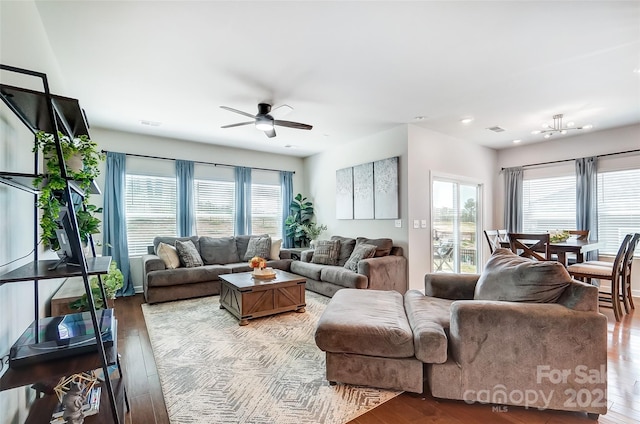 4337 Duplin Dr, Charlotte, NC 28214 - living room with visible vents, ceiling fan, and wood finished floors