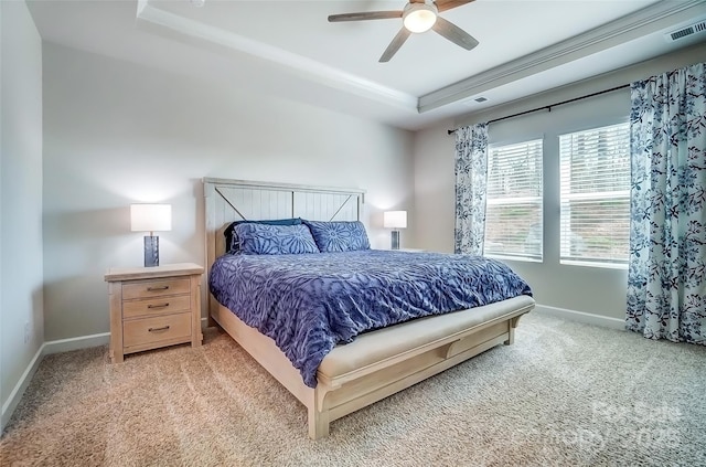 4337 Duplin Dr, Charlotte, NC 28214 - bedroom featuring baseboards, a tray ceiling, visible vents, and light carpet