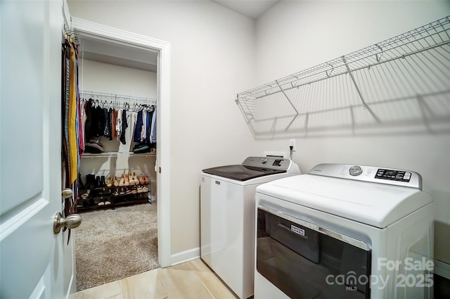 4337 Duplin Dr, Charlotte, NC 28214 - laundry room with independent washer and dryer, light colored carpet, laundry area, and baseboards