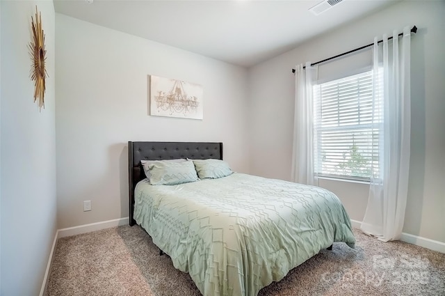 4337 Duplin Dr, Charlotte, NC 28214 - carpeted bedroom featuring baseboards and visible vents