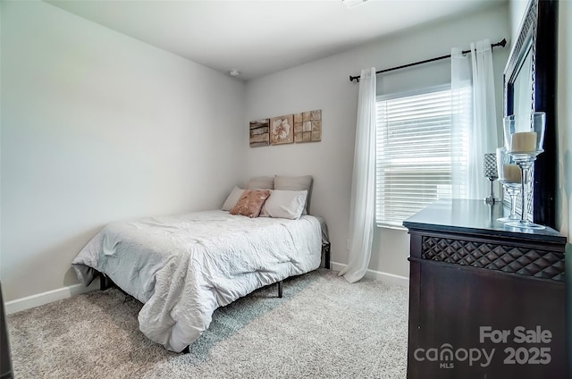 4337 Duplin Dr, Charlotte, NC 28214 - carpeted bedroom featuring baseboards