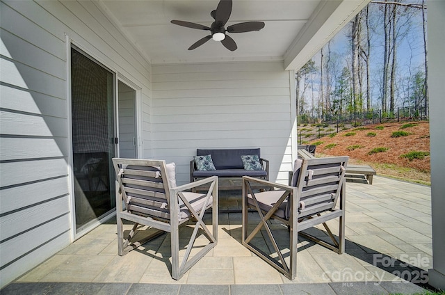 4337 Duplin Dr, Charlotte, NC 28214 - view of patio with a ceiling fan, an outdoor living space, and fence