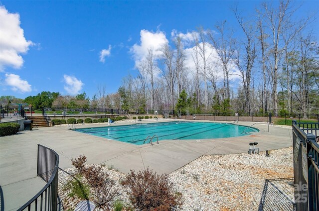 4337 Duplin Dr, Charlotte, NC 28214 - community pool with fence and a patio area