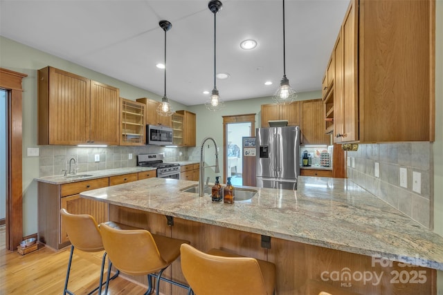 298 Poplar Grove Ct, Taylorsville, NC 28681 - kitchen with open shelves, a peninsula, a sink, and appliances with stainless steel finishes