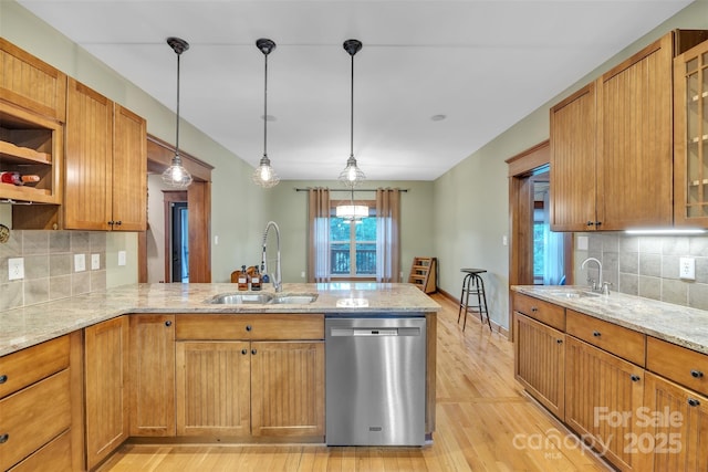 298 Poplar Grove Ct, Taylorsville, NC 28681 - kitchen with light wood-style floors, a sink, a peninsula, and dishwasher