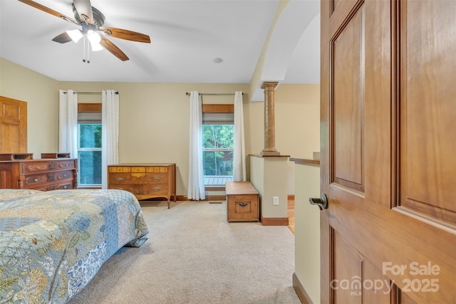 298 Poplar Grove Ct, Taylorsville, NC 28681 - bedroom featuring baseboards, ceiling fan, light colored carpet, ornate columns, and arched walkways
