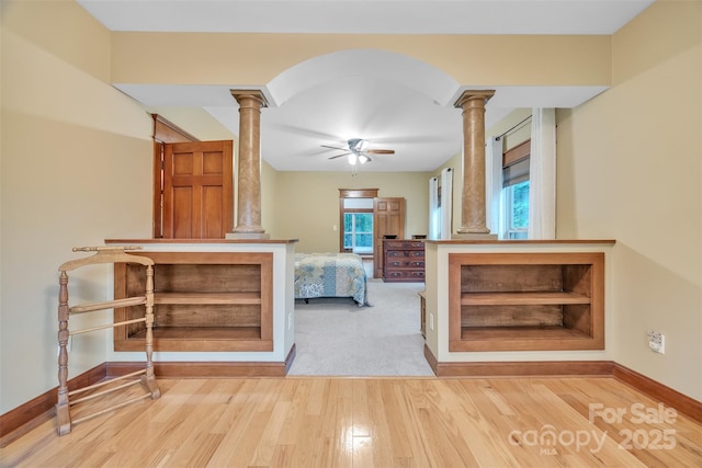 298 Poplar Grove Ct, Taylorsville, NC 28681 - unfurnished bedroom with baseboards, ornate columns, and wood finished floors