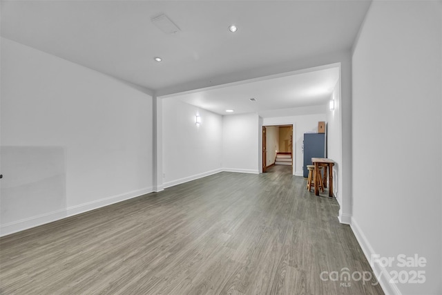 298 Poplar Grove Ct, Taylorsville, NC 28681 - unfurnished living room with recessed lighting, baseboards, and wood finished floors