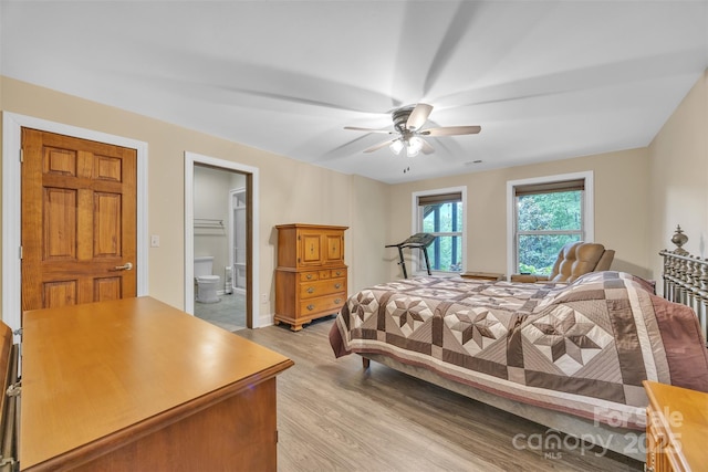 298 Poplar Grove Ct, Taylorsville, NC 28681 - bedroom featuring light wood-style floors, baseboards, ceiling fan, and ensuite bath