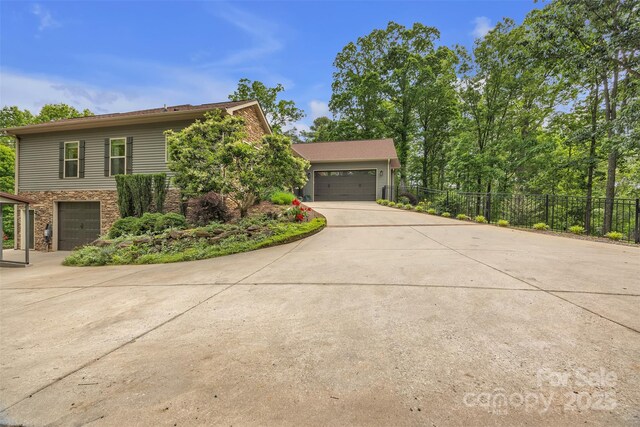 298 Poplar Grove Ct, Taylorsville, NC 28681 - view of front facade with brick siding, fence, and driveway