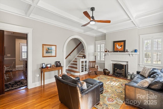 213 S Academy St, Mooresville, NC 28115 - living area featuring wood finished floors, coffered ceiling, and plenty of natural light