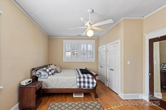 213 S Academy St, Mooresville, NC 28115 - bedroom with baseboards, wood finished floors, and crown molding