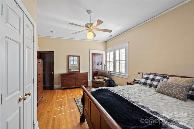 213 S Academy St, Mooresville, NC 28115 - bedroom featuring light wood-type flooring, visible vents, ceiling fan, and ornamental molding