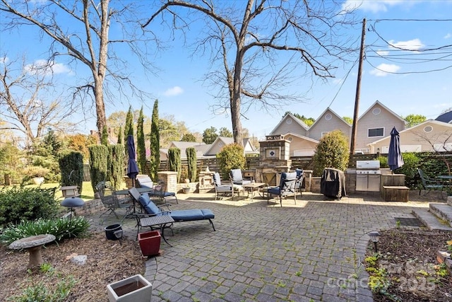 213 S Academy St, Mooresville, NC 28115 - view of home's community featuring exterior kitchen and a patio area