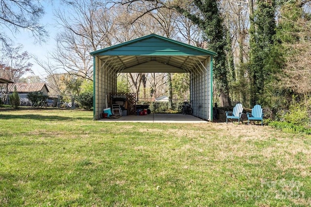213 S Academy St, Mooresville, NC 28115 - view of yard featuring driveway and a carport