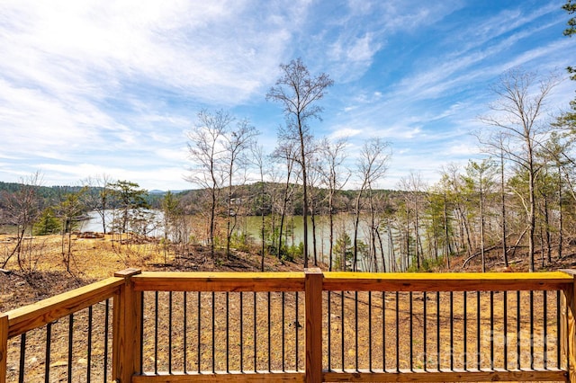 wooden deck with a water view