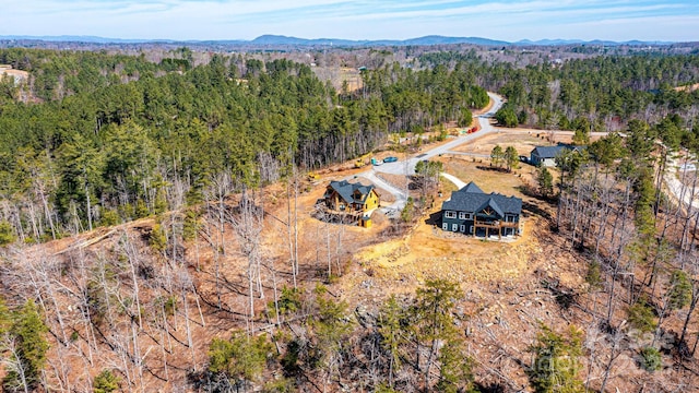 bird's eye view featuring a view of trees
