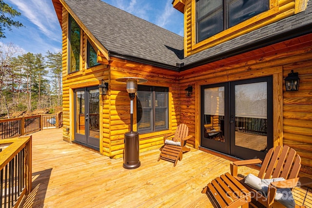 wooden terrace featuring french doors