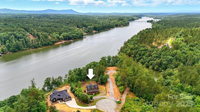 1519 Reflections Edge Dr, Granite Falls, NC 28630 - aerial view of property and surrounding area with a heavily wooded area and a water and mountain view