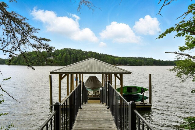 1519 Reflections Edge Dr, Granite Falls, NC 28630 - dock area featuring a water view, a view of trees, and boat lift