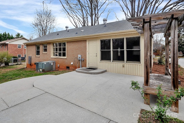 403 Hillcrest Dr, Huntersville, NC 28078 - rear view of property featuring brick siding, central air condition unit, crawl space, and a patio area