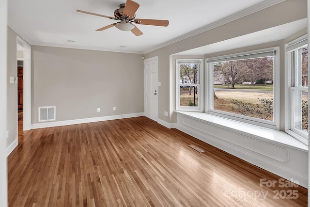 403 Hillcrest Dr, Huntersville, NC 28078 - unfurnished room featuring light wood-type flooring, ceiling fan, visible vents, and crown molding