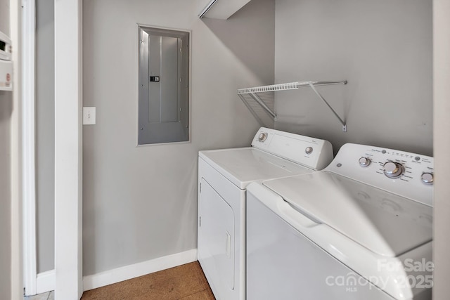 403 Hillcrest Dr, Huntersville, NC 28078 - laundry room featuring electric panel, baseboards, washing machine and clothes dryer, and laundry area