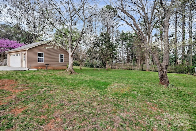 403 Hillcrest Dr, Huntersville, NC 28078 - view of yard featuring driveway and a garage