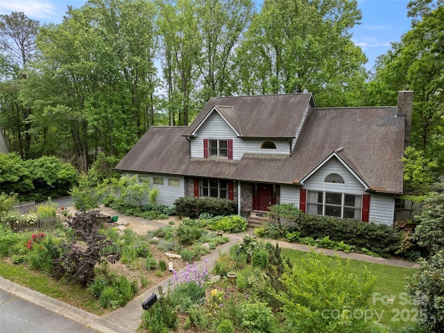 5 Spring Cove Ct, Arden, NC 28704 - traditional-style home with a chimney and roof with shingles