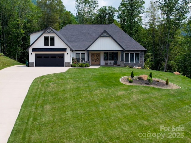 20 Slate Dr, Candler, NC 28715 - modern farmhouse style home featuring driveway, a front lawn, a garage, and stone siding