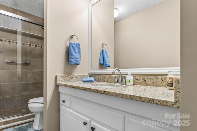 3829 Norman Rd, Morganton, NC 28655 - full bath with toilet, vanity, a stall shower, and a textured ceiling