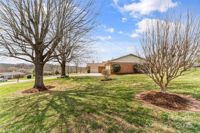 3829 Norman Rd, Morganton, NC 28655 - view of yard with driveway and an attached garage