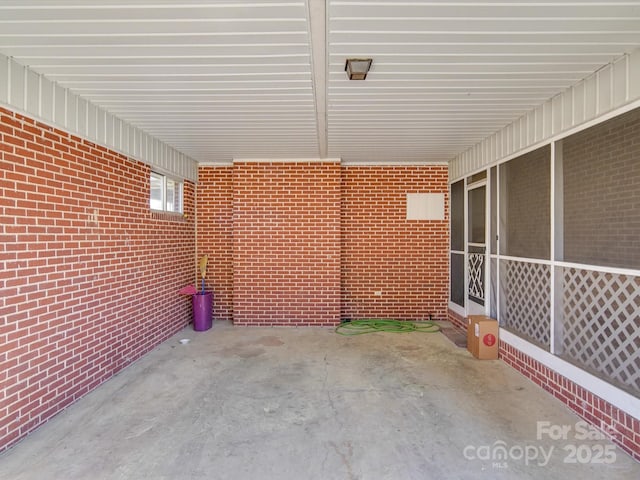 view of patio / terrace with a carport