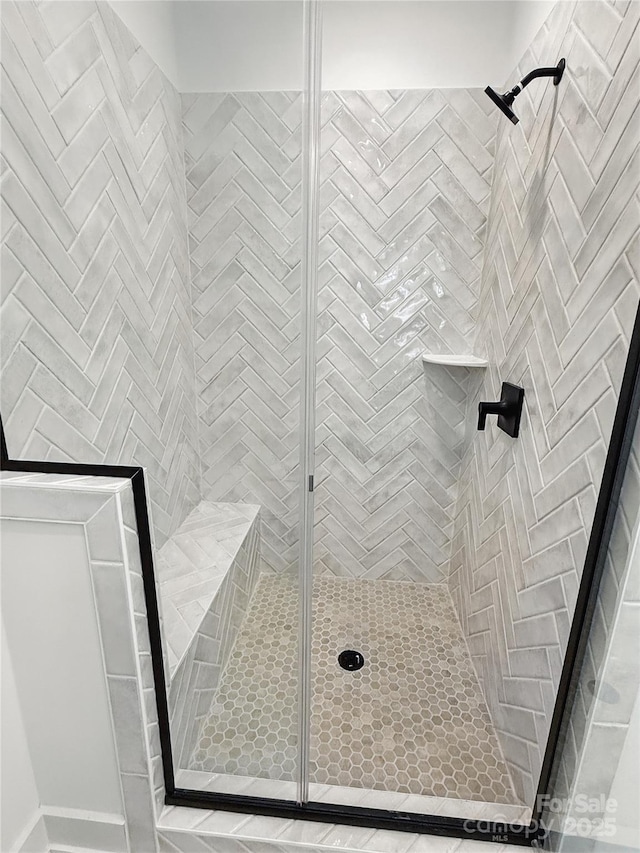 bathroom with a stall shower