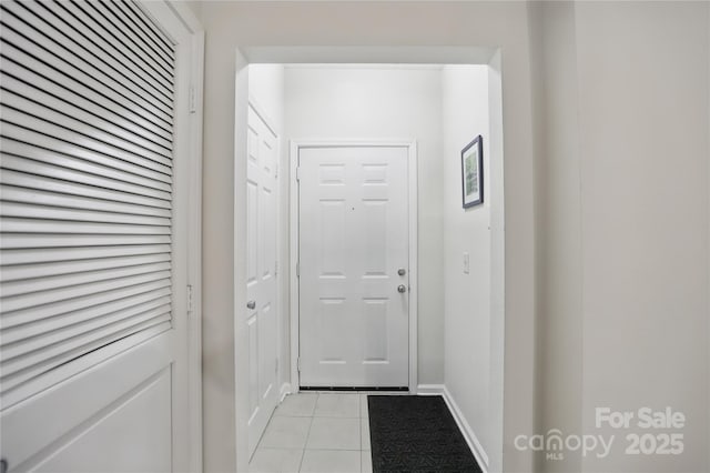 entryway featuring light tile patterned floors